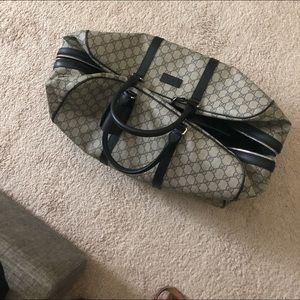 Authentic Gucci 45 duffle luggage on wheels